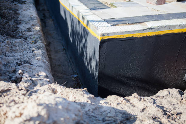 Professional Waterproofing technician working in Addison, MI